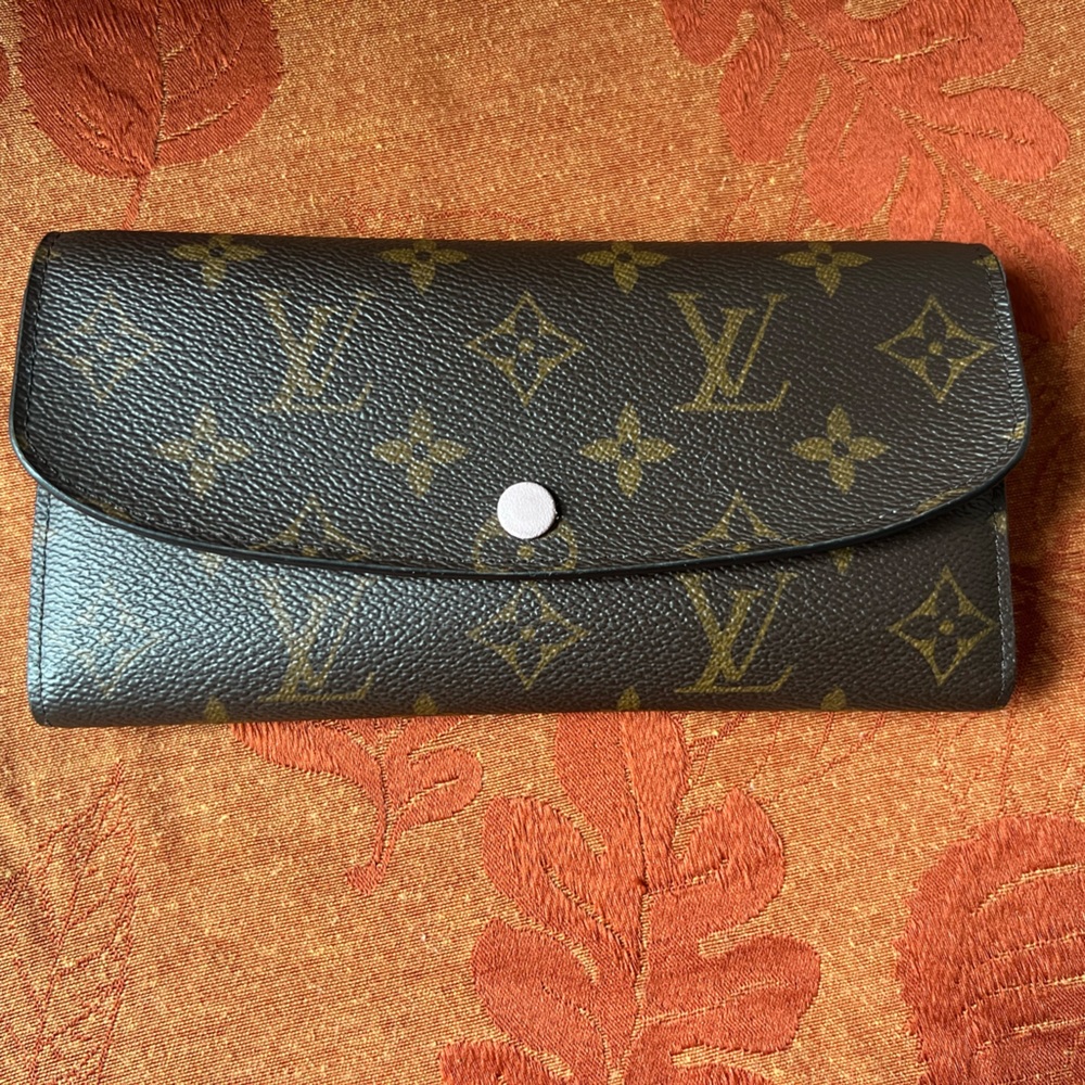 LV wallet gently used with pink inside